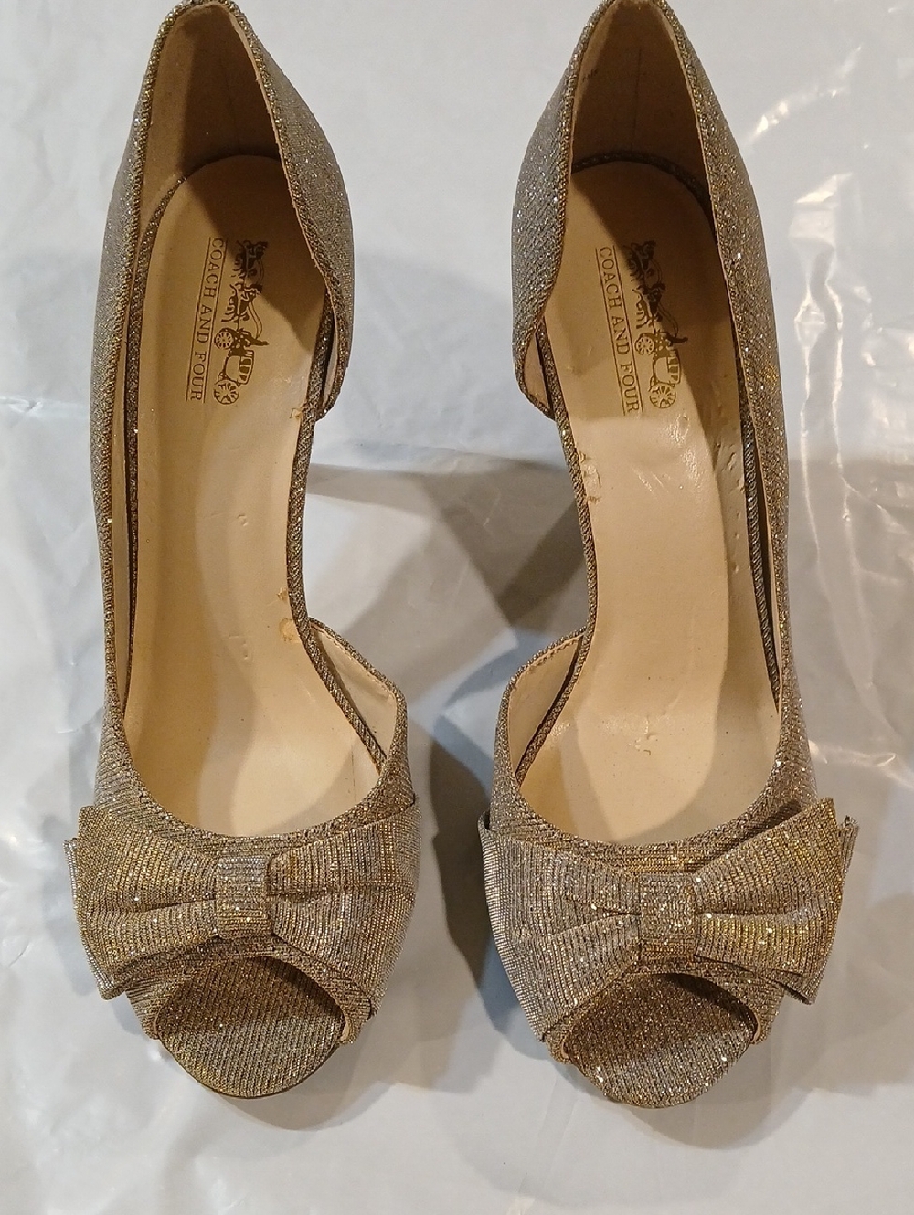 Coach and Four Glitter Bow Peep-Toe Heels in Gold
